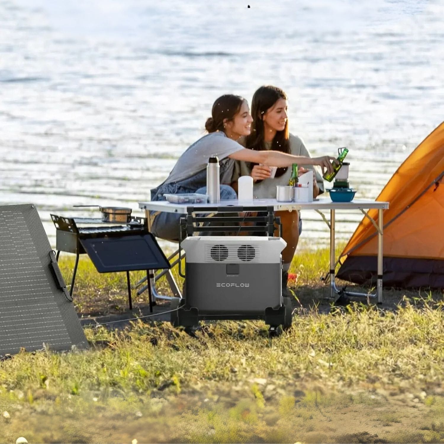 EcoFlow DELTA 3 1500 Portable Power Station connected to a solar panel by the seashore, with two women camping nearby