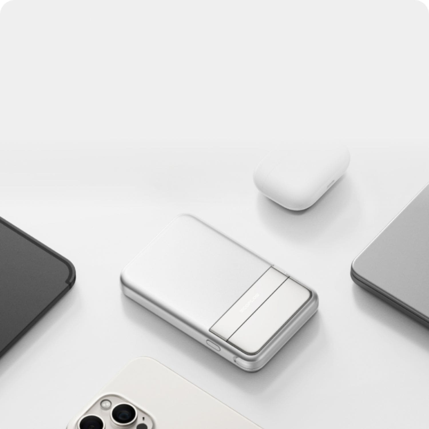 EcoFlow RAPID Magnetic Power Bank with earpods and phone