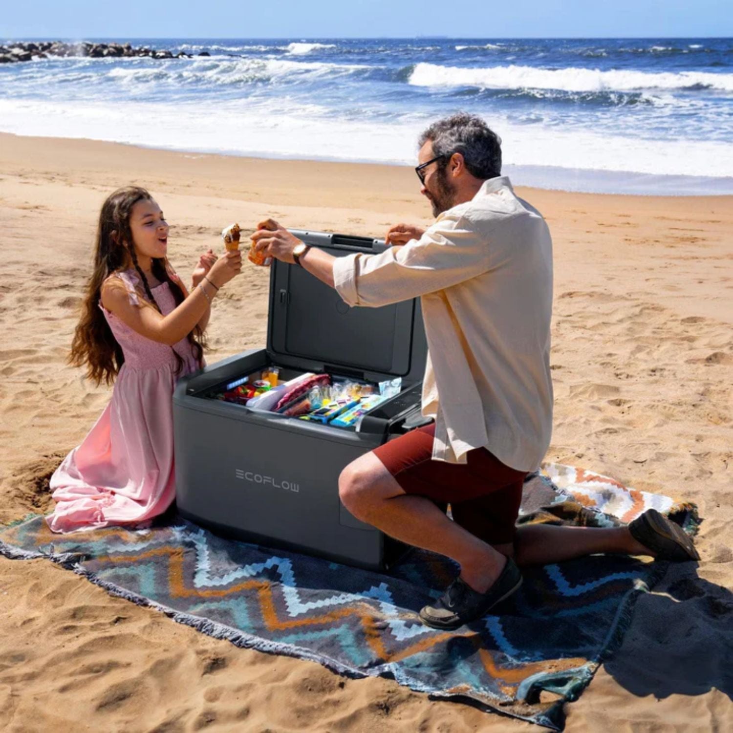 Father and daughter using the EcoFlow GLACIER Classic Portable Fridge Freezer